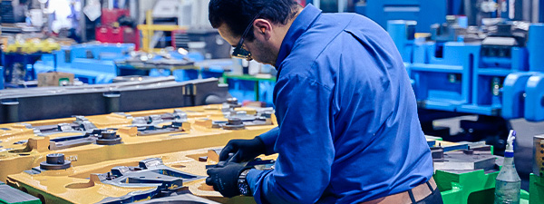 Man working on a tooling die